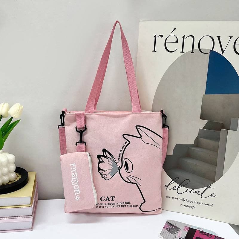 purseA faded pink tote bag